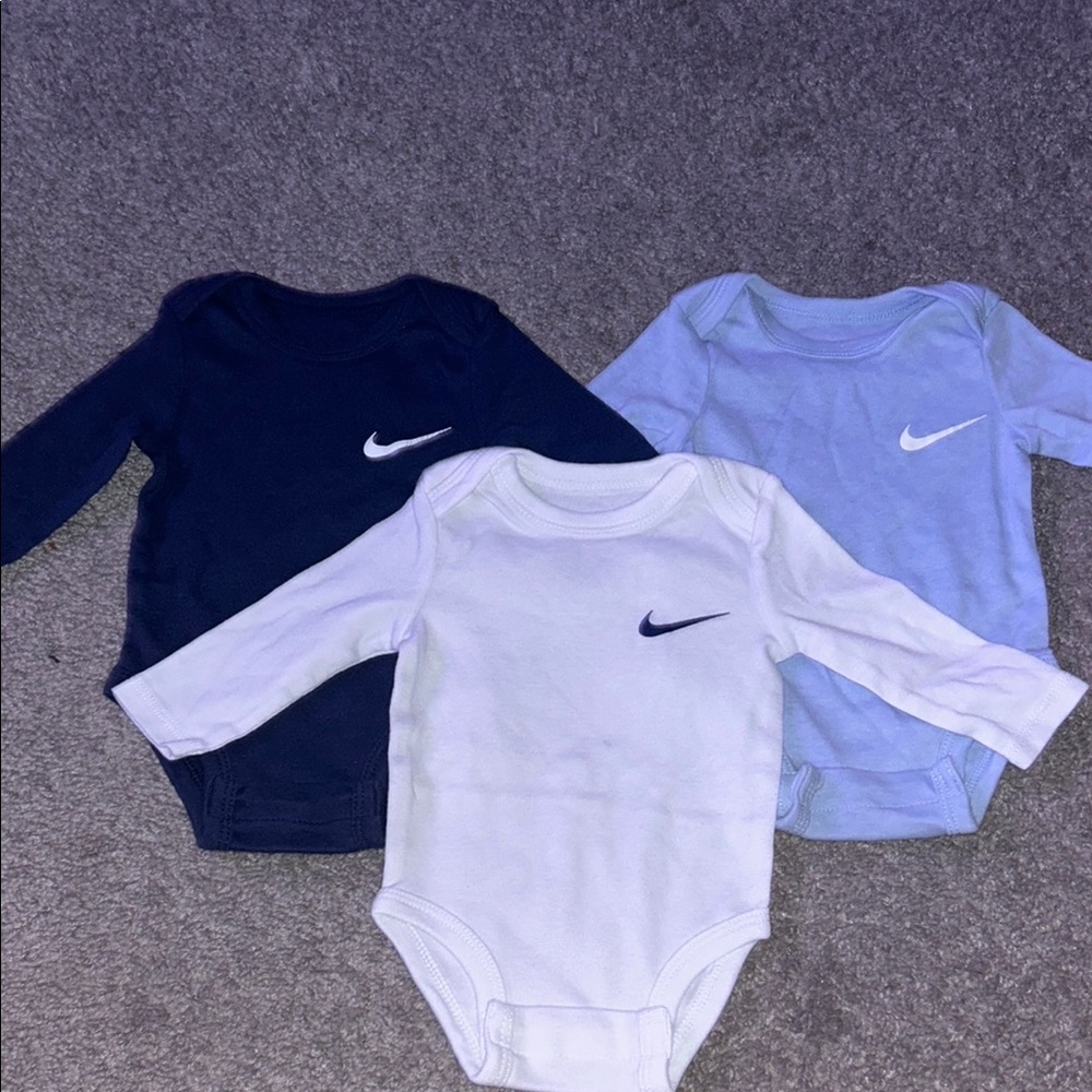 Nike Blue Bodysuit Collection with Iconic Swoosh